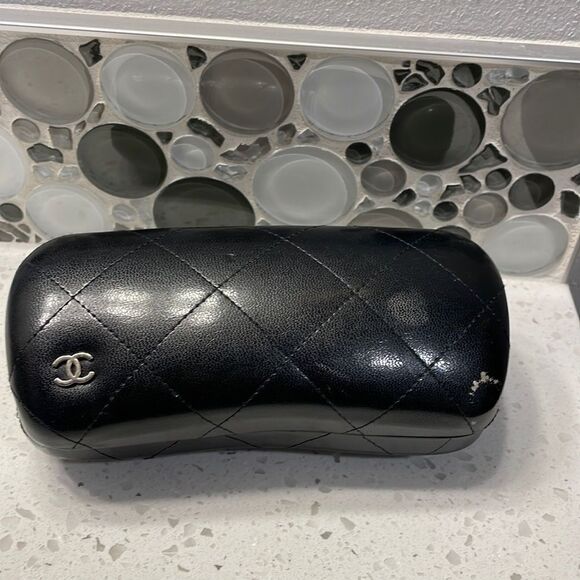 Chanel black leather quilted sunglass case. No sunglasses just the case